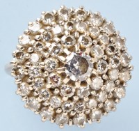 Lot 746 - A diamond cluster ring, the four tiers set...