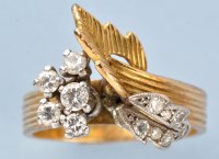 Lot 747 - A diamond and gold ring, the leaf pattern...