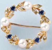 Lot 754 - A sapphire, diamond and cultured pearl wreath...