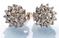 Lot 766 - A pair of diamond cluster stud earrings,...