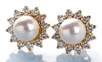 Lot 789 - A pair of cultured pearl and diamond cluster...