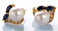 Lot 791 - A pair of cultured pearl, sapphire and diamond...