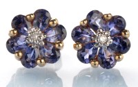 Lot 797 - A pair of sapphire and diamond cluster...