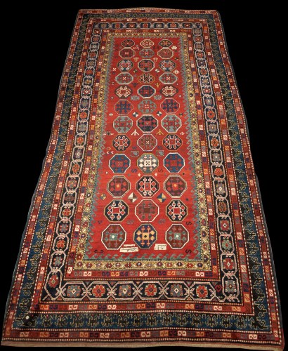 Lot 819 - A Caucasian carpet, the field set with...