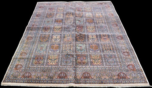 Lot 837 - A Tabriz carpet, with panels of floral designs,...
