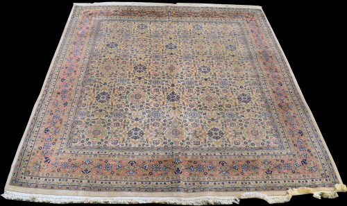 Lot 839 - A Tabriz carpet, the ivory ground with full...