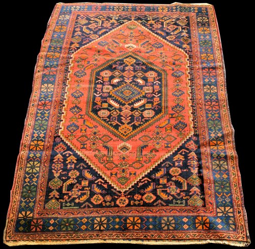 Lot 850 - A Malaya rug, the central medallion and ground...