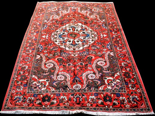 Lot 854 - A Bakhtiari carpet, with full floral...