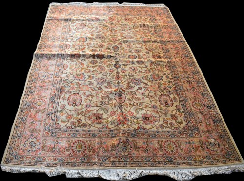 Lot 859 - A Tabriz carpet, with floral scrolling design...