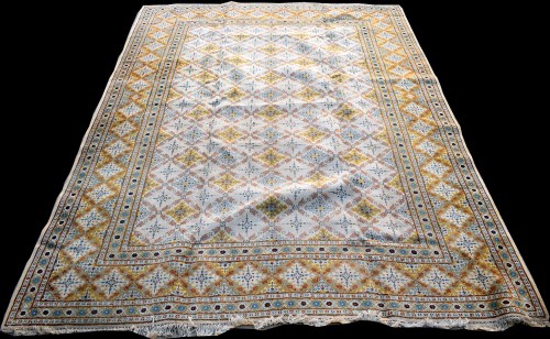 Lot 864 - A Kashan carpet, with diamond-shaped floral...