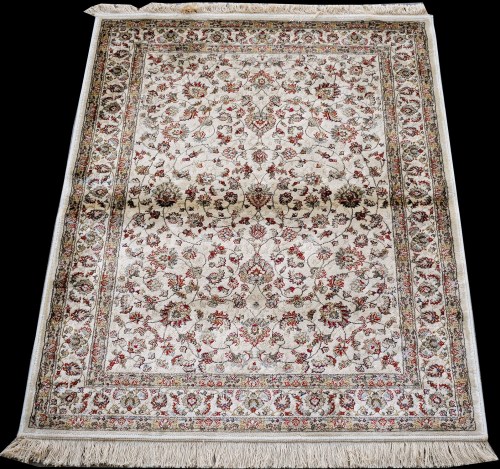 Lot 883 - A Kashmir rug, with scrolling floral design on...
