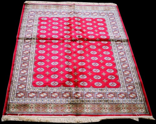 Lot 884 - A Kashmir Bokhara type rug, with tekke...