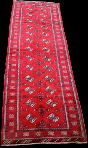 Lot 886 - A woven wool runner, with Bokhara design, 269...
