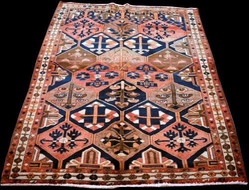 Lot 891 - A Bakhtiari rug, with diamond-shaped panels...