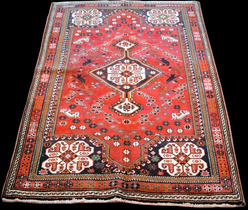 Lot 892 - A Quashqai rug, with central diamond-shaped...