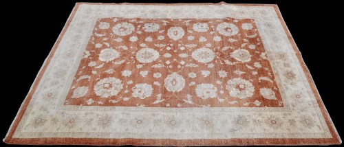 Lot 903 - An Afghan Ziegler carpet, the terracotta field...