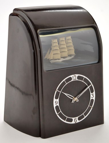 Lot 910 - Vitascope: a bakelite automaton clock, with...