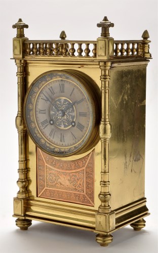Lot 919 - A French gilt brass mantel clock, the roman...