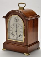 Lot 921 - An early 20th Century mahogany mantel clock,...