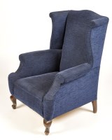 Lot 976 - A George II style wing back armchair, the...