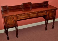 Lot 978 - An early 19th Century mahogany sideboard, the...