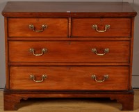 Lot 984 - A George III style chest of two short and two...