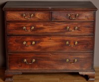 Lot 993 - A George III mahogany chest of two short and...