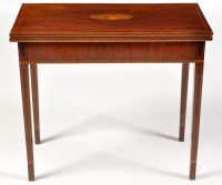 Lot 1005 - A Georgian rectangular mahogany tea table, the...