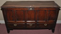 Lot 1014 - An 18th Century oak blanket box, the plank top...