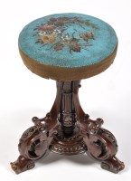 Lot 1049 - A Victorian carved mahogany piano stool, the...