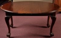 Lot 1053 - A Victorian mahogany extending dining table,...