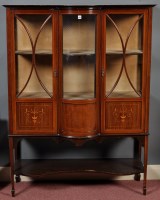 Lot 1055 - An Edwardian inlaid mahogany display cabinet,...