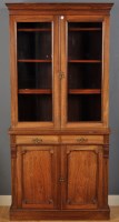 Lot 1056 - A late Victorian rosewood bookcase, the ogee...
