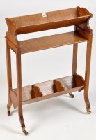 Lot 1057 - An early 20th Century oak book stand,...