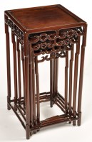 Lot 1058 - A nest of four Chinese hardwood tea tables,...