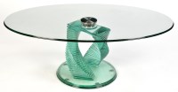 Lot 3 - A modern glass coffee table, the oval plated...