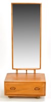 Lot 22 - Ercol: an elm cheval mirror, the rectangular...