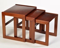 Lot 43 - A nest of three teak tables, c.1970, the...