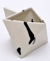 Lot 146 - A modern ceramic cream jug, of diamond form,...