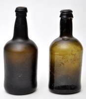 Lot 331 - Two green glass bottles, one with moulded...