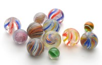 Lot 332 - Eight coloured twist glass marbles, diameter...