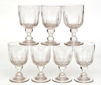 Lot 336 - Set of seven glass wine goblets, faceted ovoid...