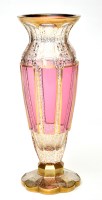 Lot 338 - Bohemian pale ruby and gilded glass vase, of...