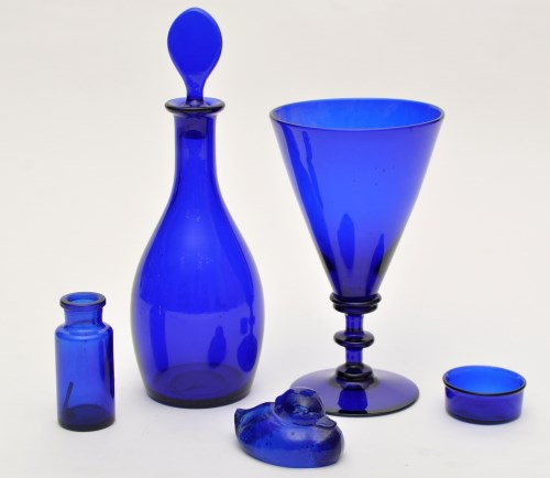 Lot 341 - Moulded blue glass swimming duck paperweight,...