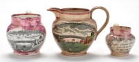 Lot 388 - Two Lustreware coloured printed pearlware jugs...