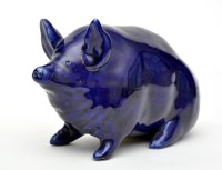 Lot 403 - Small Wemyss ware blue glaze figure of a pig,...