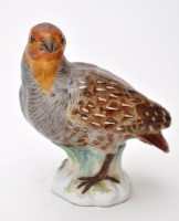 Lot 481 - Meissen model of a partridge, standing looking...