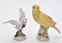 Lot 482 - Meissen model of a canary, standing looking...