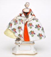 Lot 498 - Meissen style figure of a lady with two pug...
