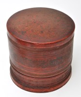 Lot 576 - Burmese red lacquer marriage box, of circular...